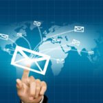 Fameblogs email contact network visualized with flying envelope icons across a digital world map.